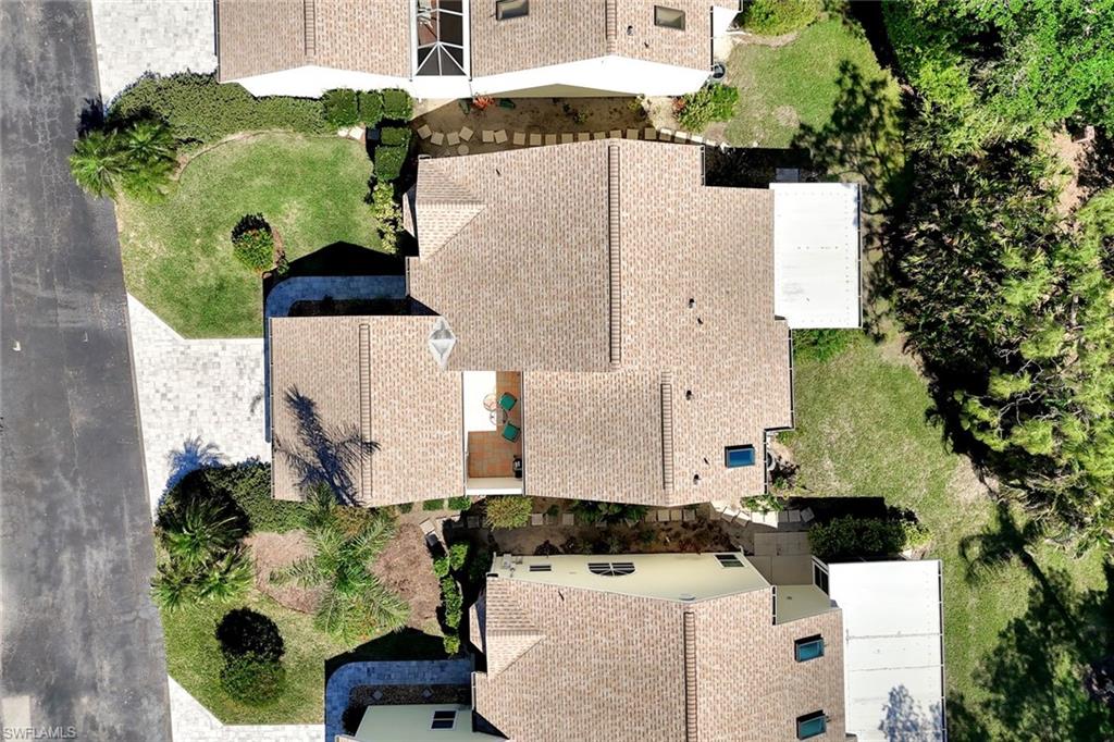 15350 Wimborne Lane, Unit 2 Naples, FL 34110 - Photo 37 of 42 an aerial view of a house with a yard