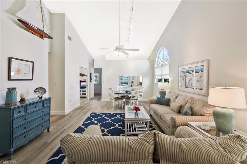 15350 Wimborne Lane, Unit 2 Naples, FL 34110 - Photo 5 of 42 a living room with furniture
