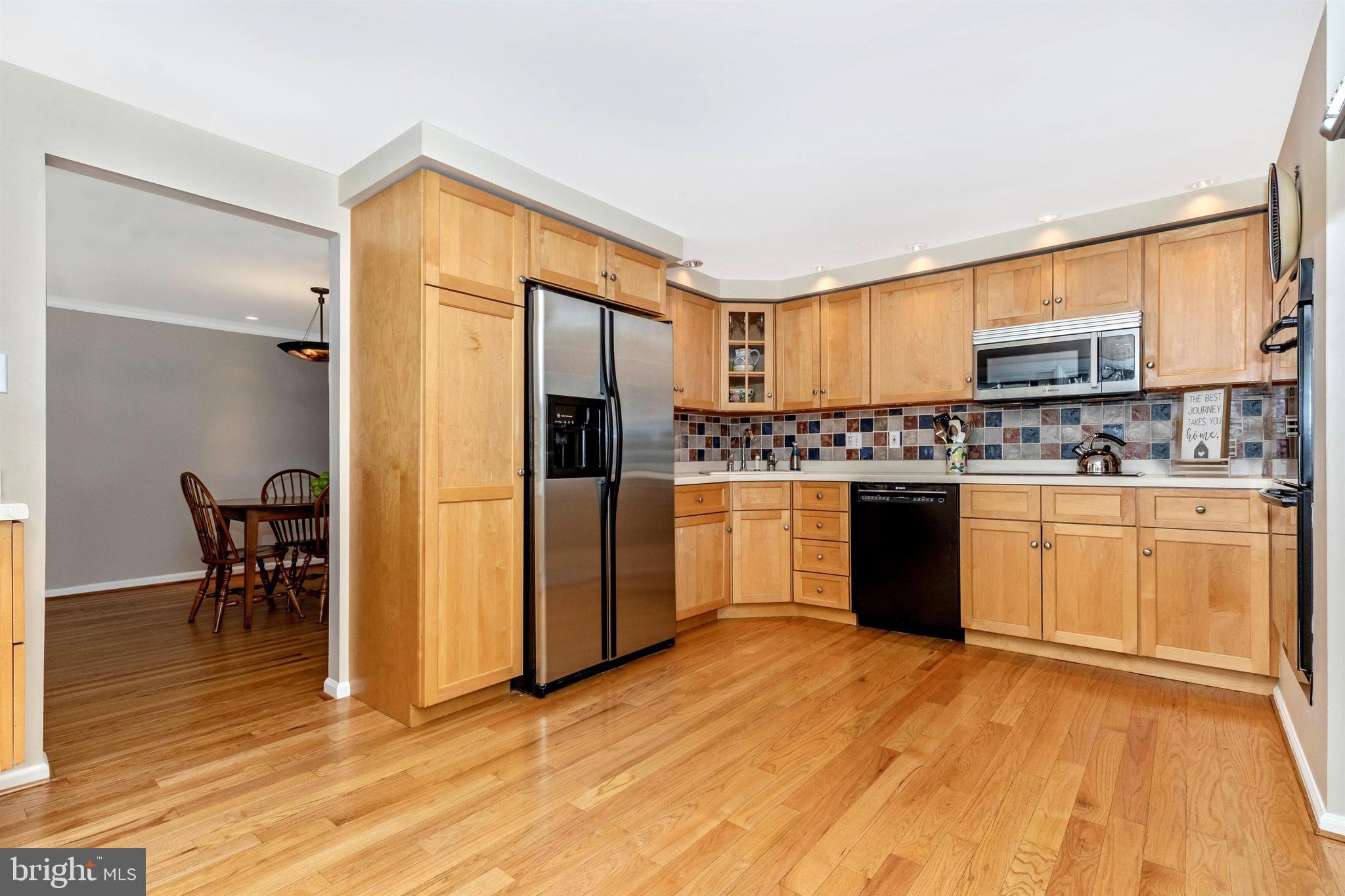 708 Blue Hill Road Wallingford, PA 19086 - Photo 10 of 61 Hardwood Floors & Tile Backsplash