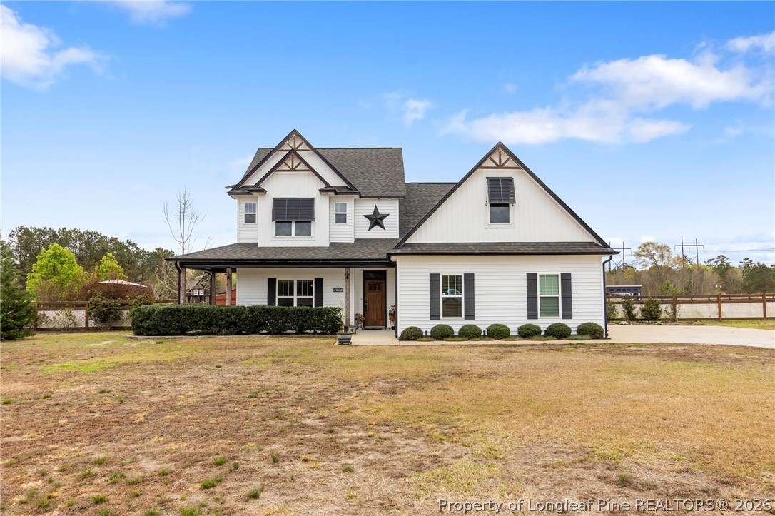 5535 Butler Nursery Road Fayetteville, NC 28306 - Photo 2 of 50 a front view of a house with a yard