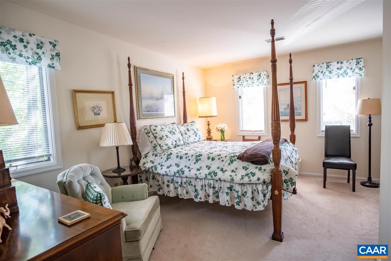1 Marina Point, Unit B1 Palmyra, VA 22963 - Photo 23 of 31 a bedroom with furniture and a large window
