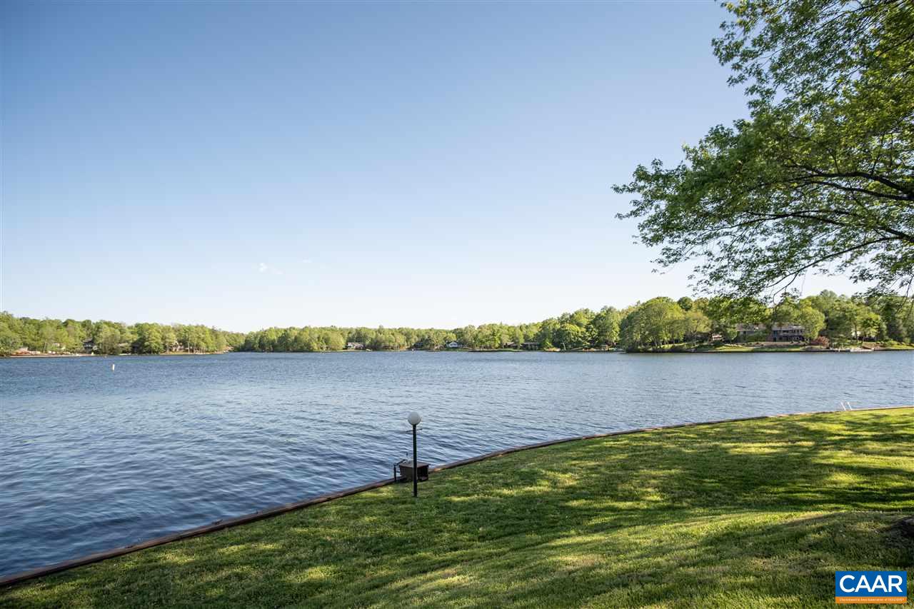 1 Marina Point, Unit B1 Palmyra, VA 22963 - Photo 26 of 31 a view of a lake with houses in the back