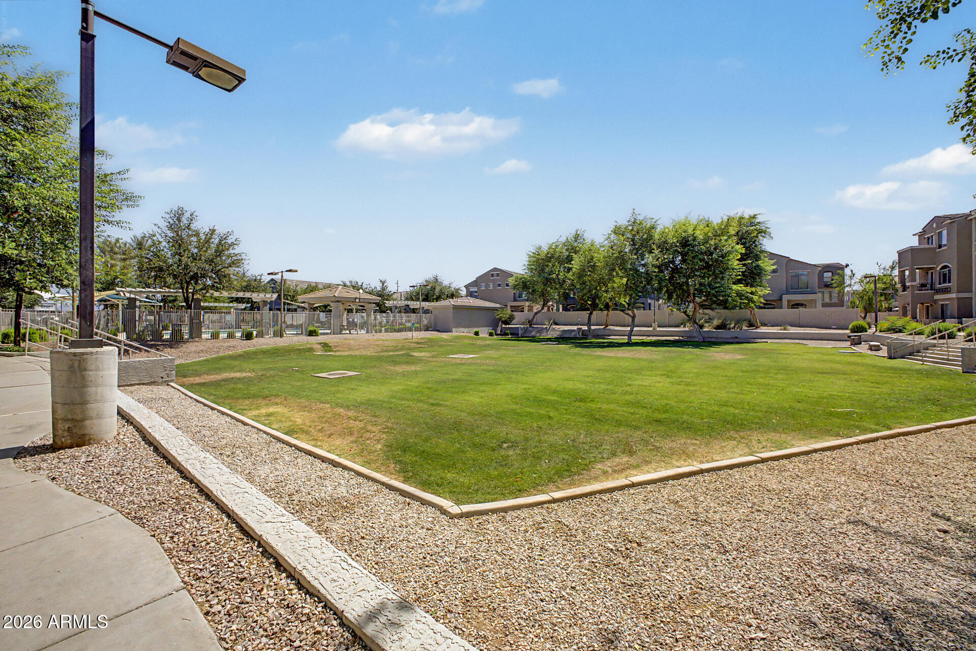 280 South Evergreen Road, Unit 1249 Tempe, AZ 85288 - Photo 25 of 31 Behind main Pool