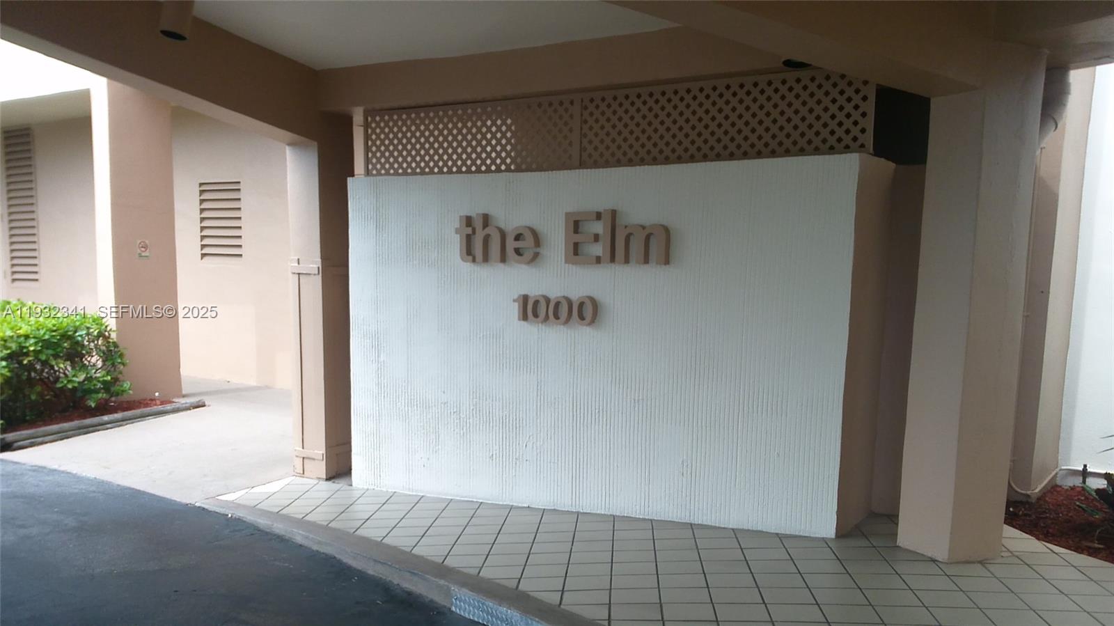 a view of a refrigerator in kitchen