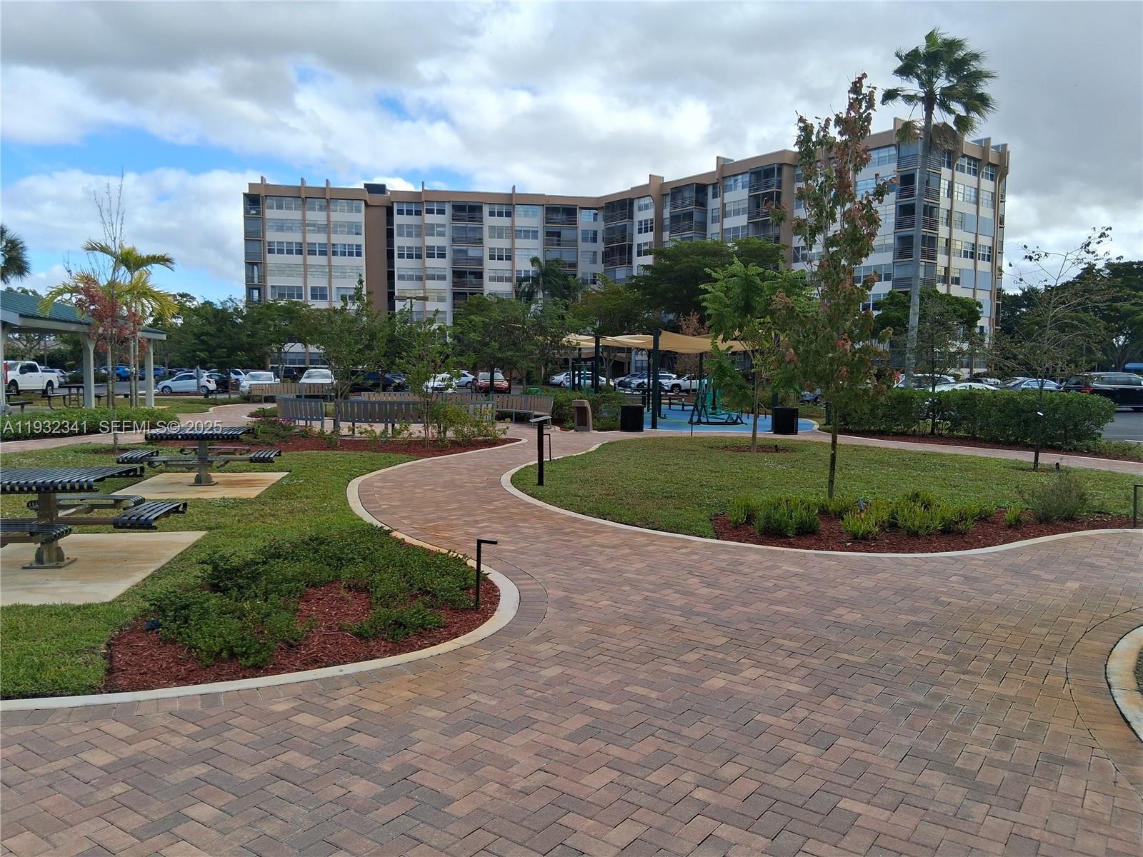 1000 St Charles Place, Unit L2 Pembroke Pines, FL 33026 - Photo 15 of 16 a view of a city with tall buildings