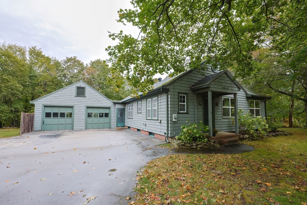 76 Ray Road Wrentham, MA 02093 - Photo 1 of 42 front view of a house with a yard