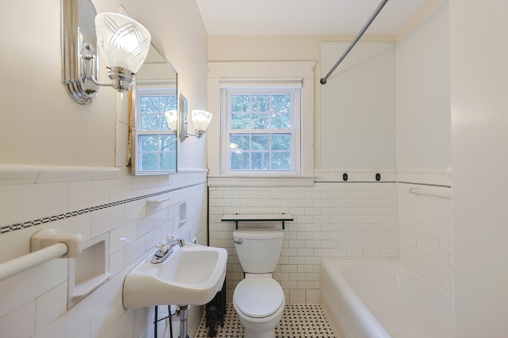 76 Ray Road Wrentham, MA 02093 - Photo 24 of 42 a bathroom with a sink a toilet and a mirror