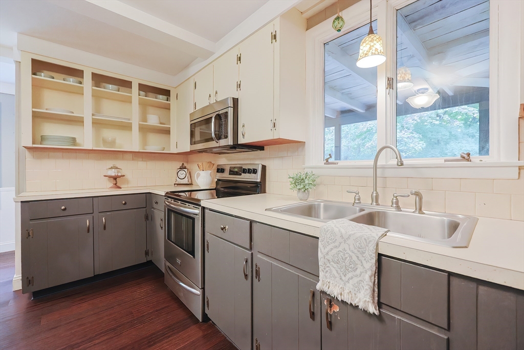 76 Ray Road Wrentham, MA 02093 - Photo 7 of 42 a kitchen with stainless steel appliances granite countertop a sink and cabinets
