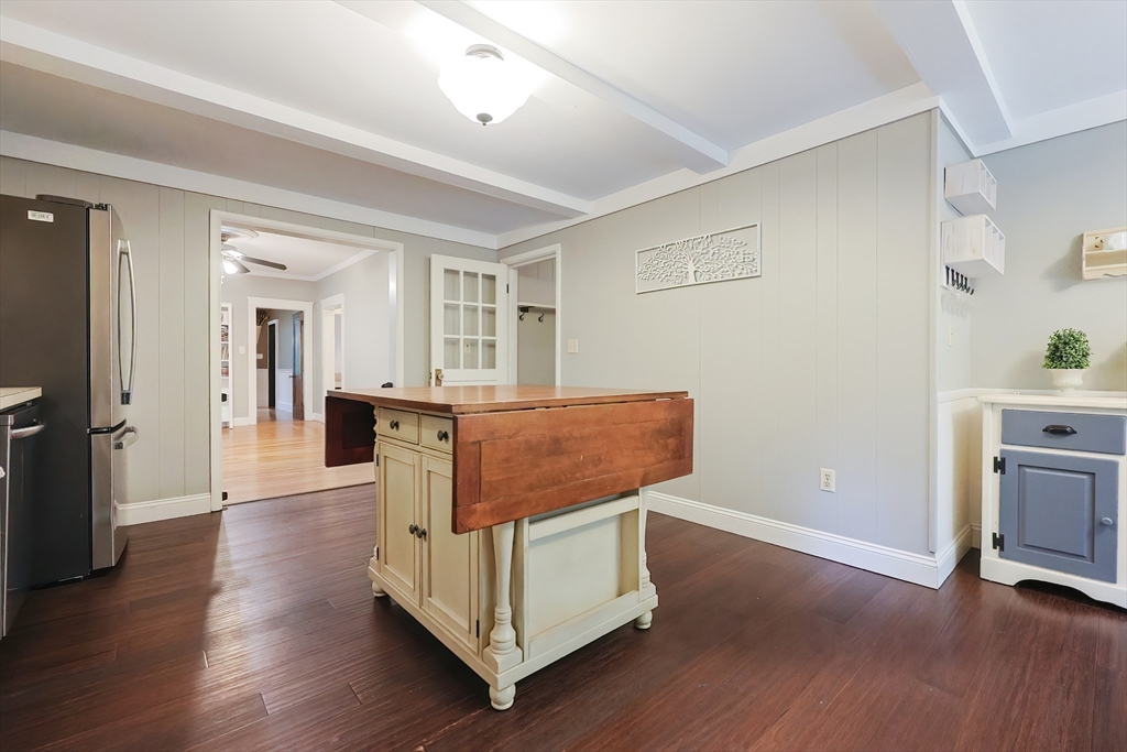 76 Ray Road Wrentham, MA 02093 - Photo 9 of 42 wooden floor and chair in a room