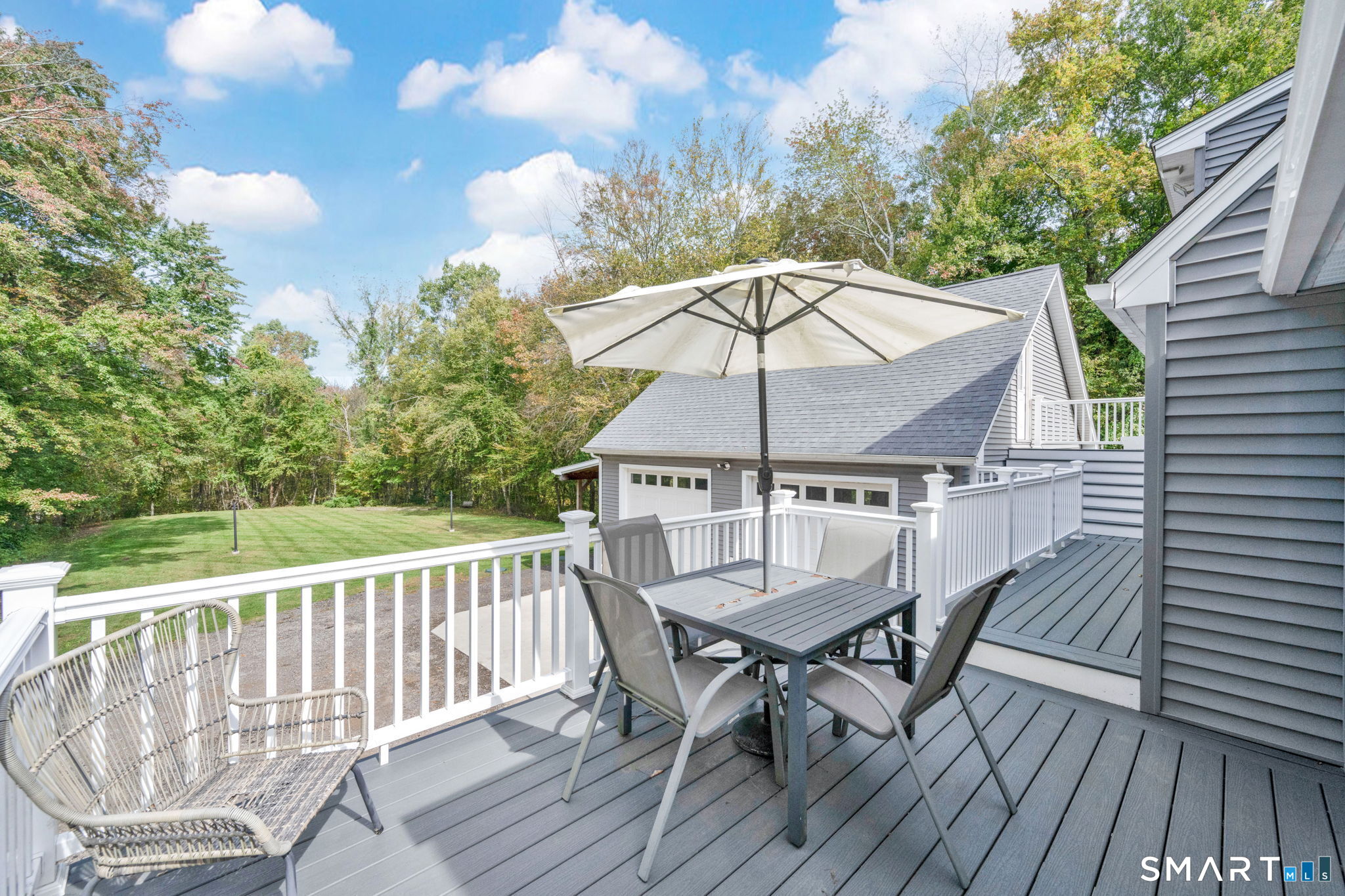 10 Eaton Road Tolland, CT 06084 - Photo 3 of 37 Trex deck with access to Garage Loft!