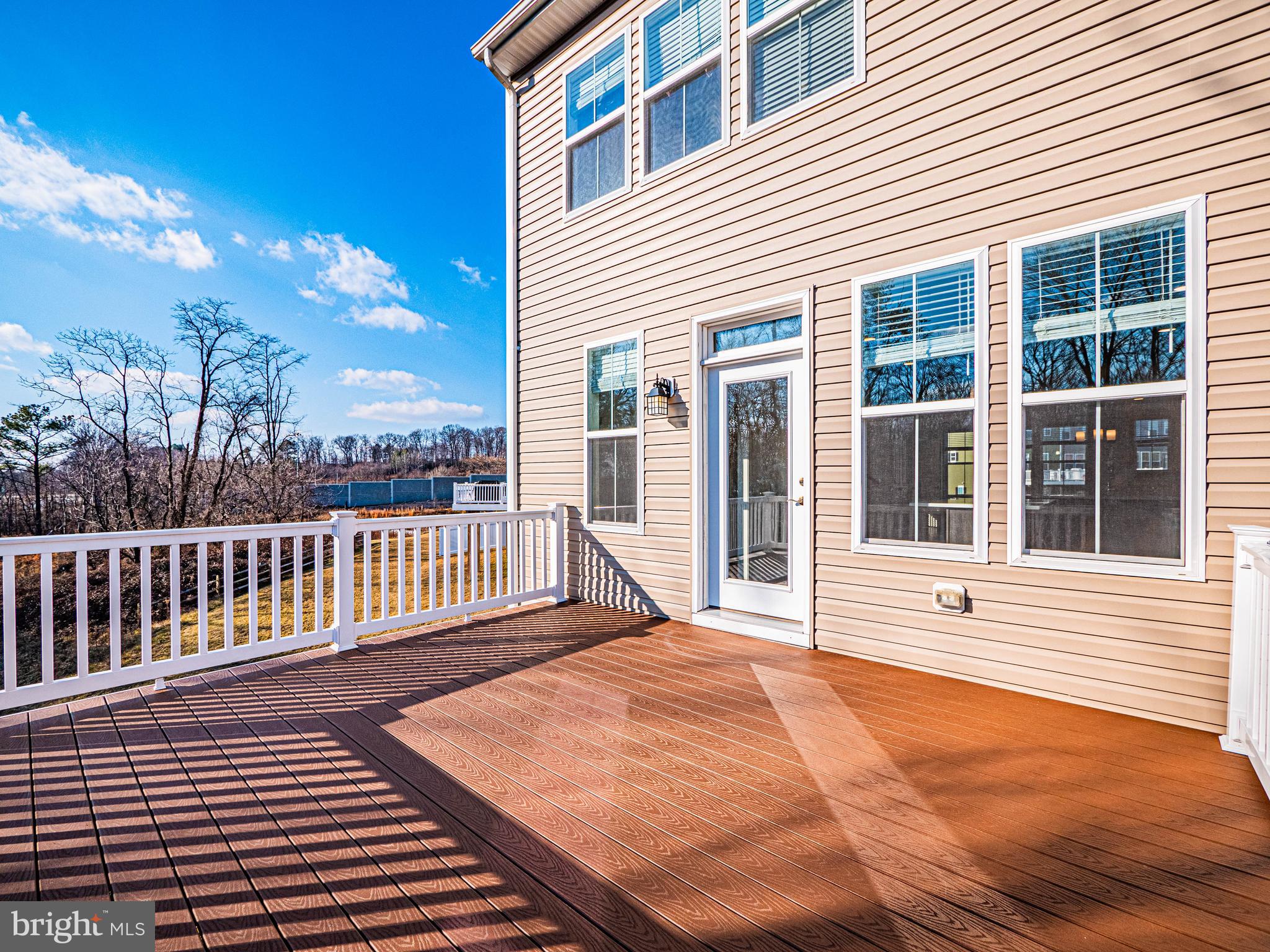 7315 Martin Farm Circle Rosedale, MD 21237 - Photo 20 of 46 a view of a balcony with wooden floor