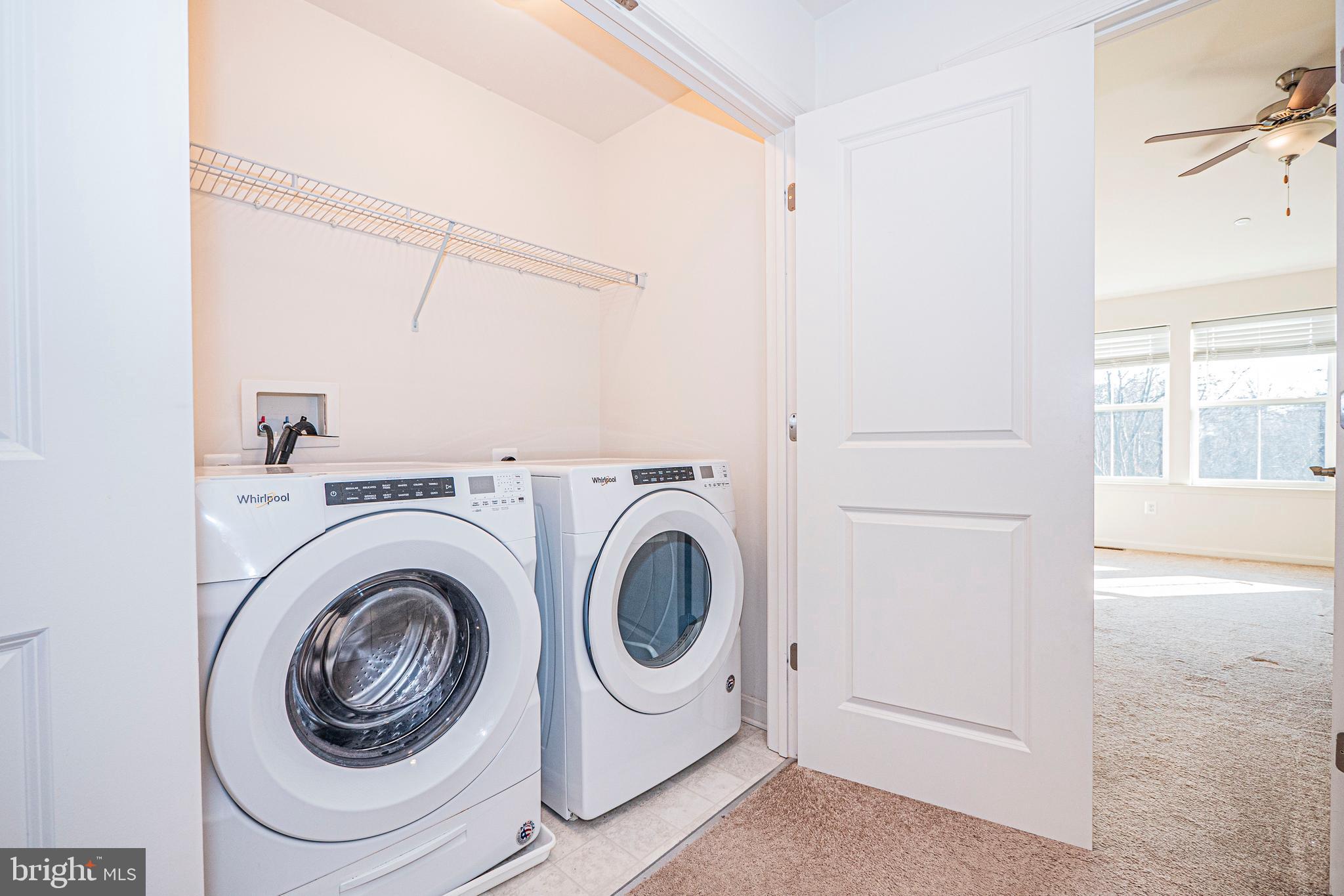 7315 Martin Farm Circle Rosedale, MD 21237 - Photo 35 of 46 a utility room with dryer and washer