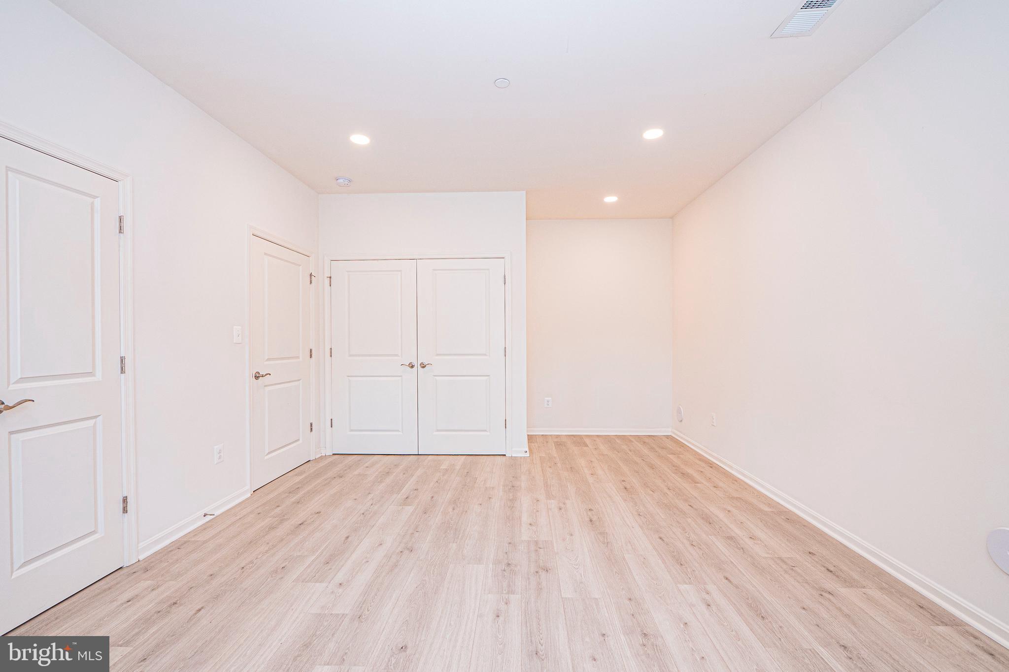 7315 Martin Farm Circle Rosedale, MD 21237 - Photo 8 of 46 a view of empty room with wooden floor