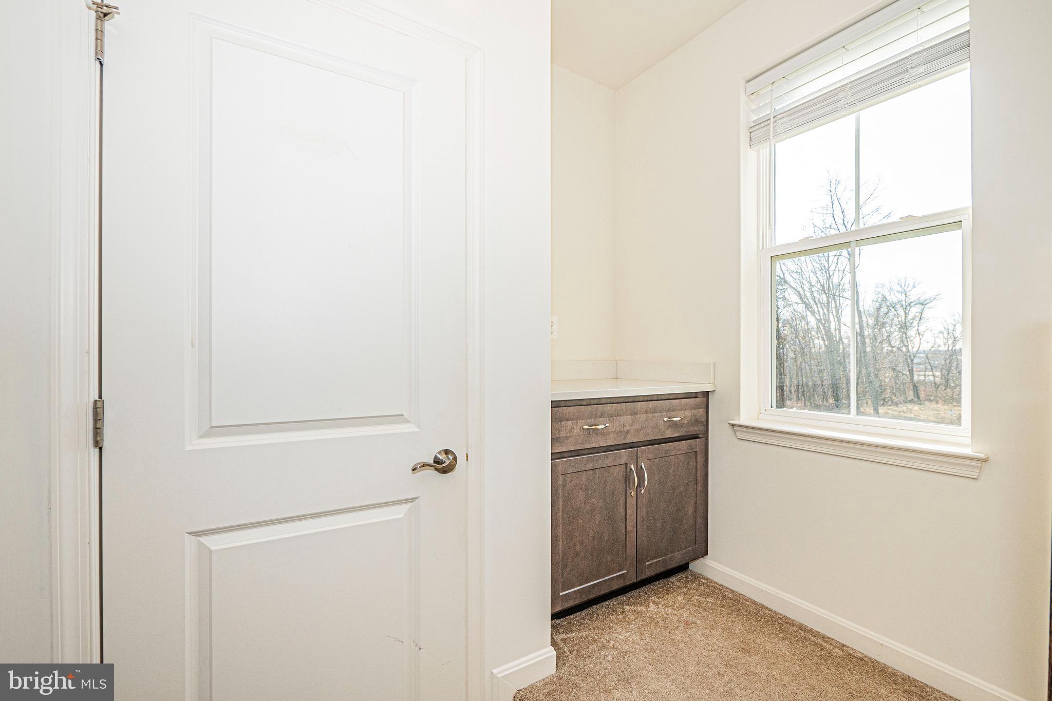 7315 Martin Farm Circle Rosedale, MD 21237 - Photo 10 of 46 a view of an empty room with a window