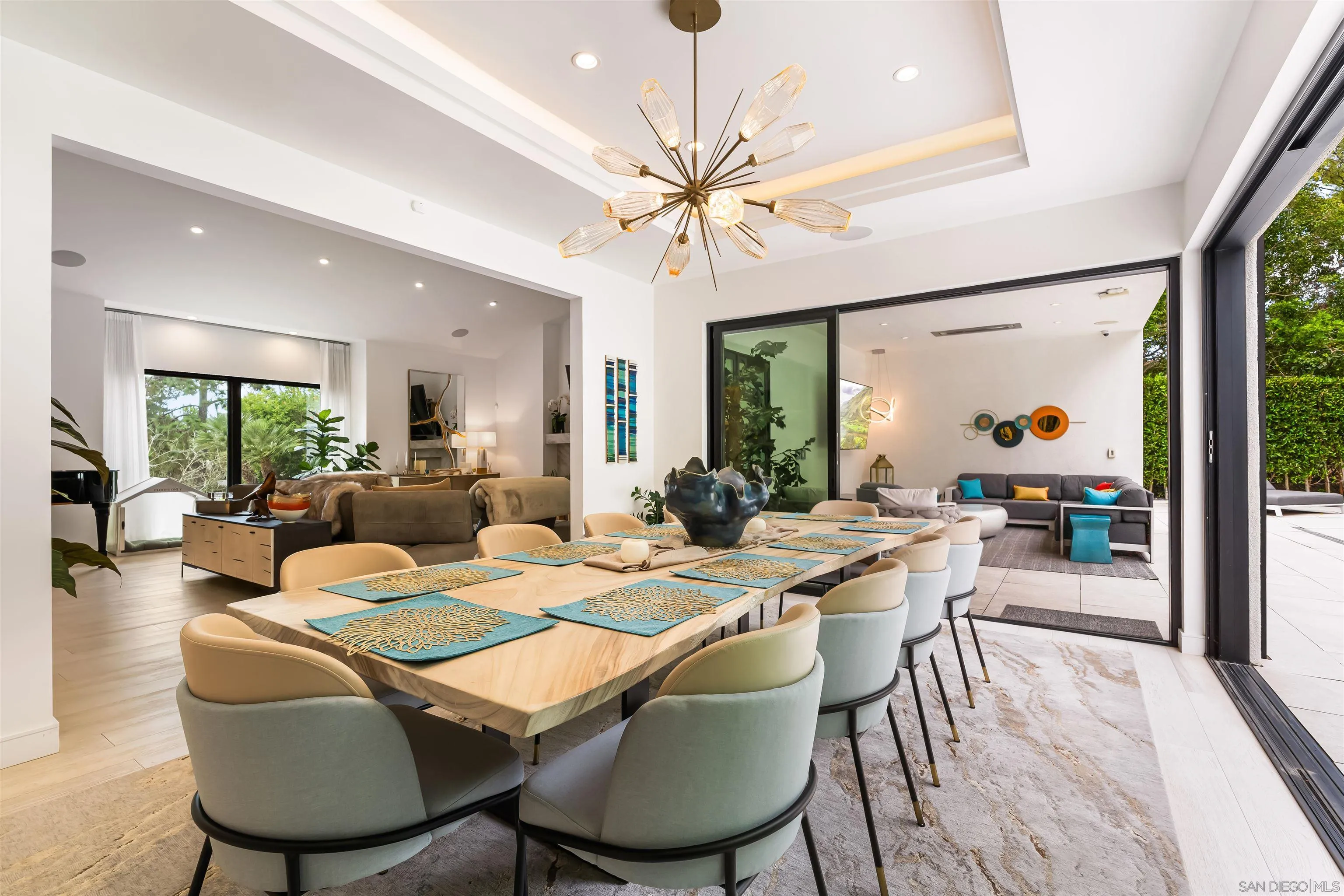 6887 Avenida Andorra La Jolla, CA 92037 - Photo 14 of 75 a view of a dining room with furniture window and wooden floor