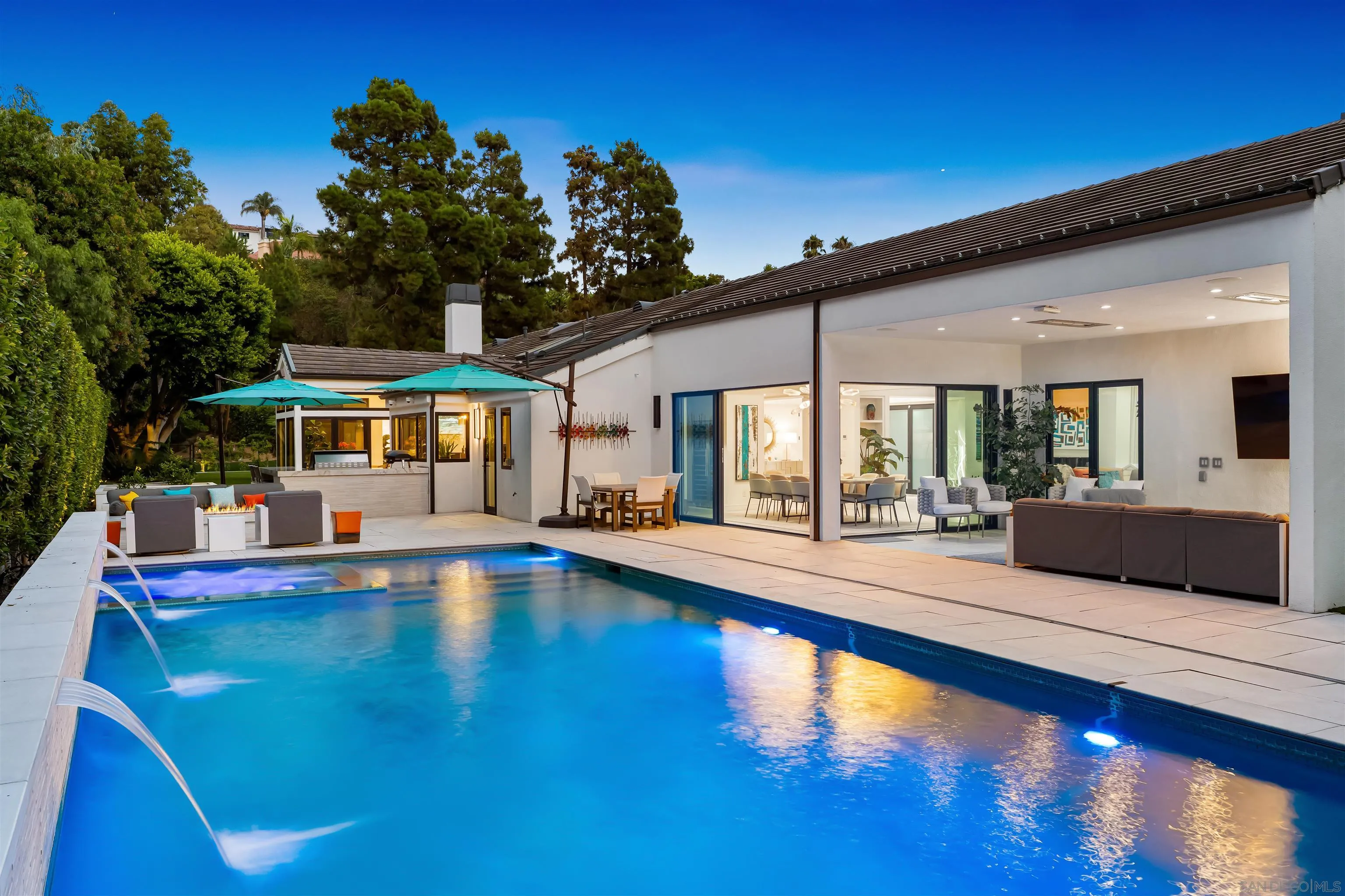 6887 Avenida Andorra La Jolla, CA 92037 - Photo 2 of 75 a swimming pool view with a outdoor seating