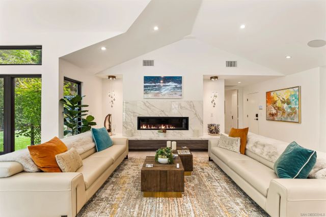 a outdoor dining space with furniture and garden view