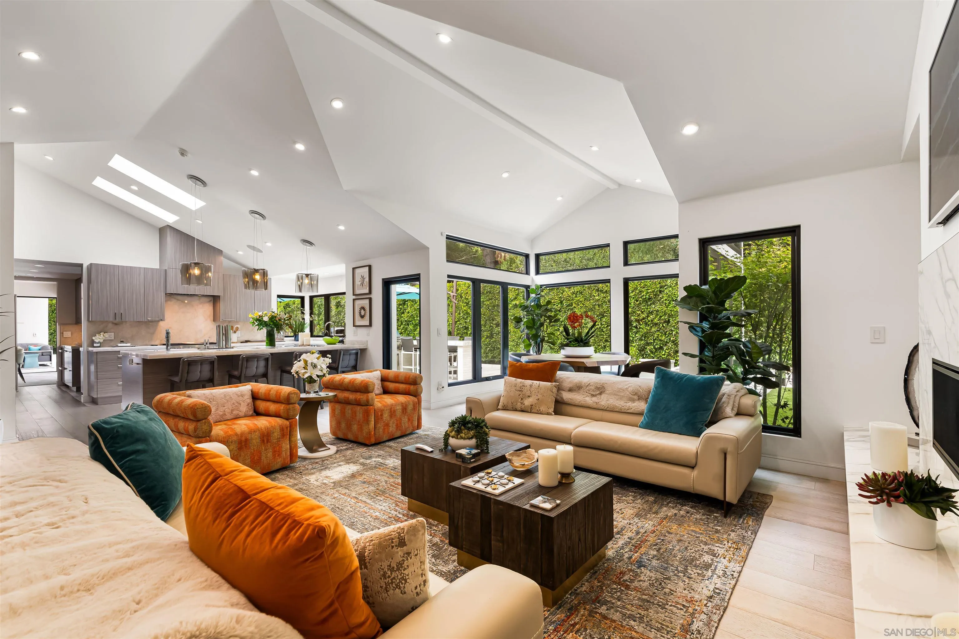 6887 Avenida Andorra La Jolla, CA 92037 - Photo 26 of 75 a living room with furniture and a large window