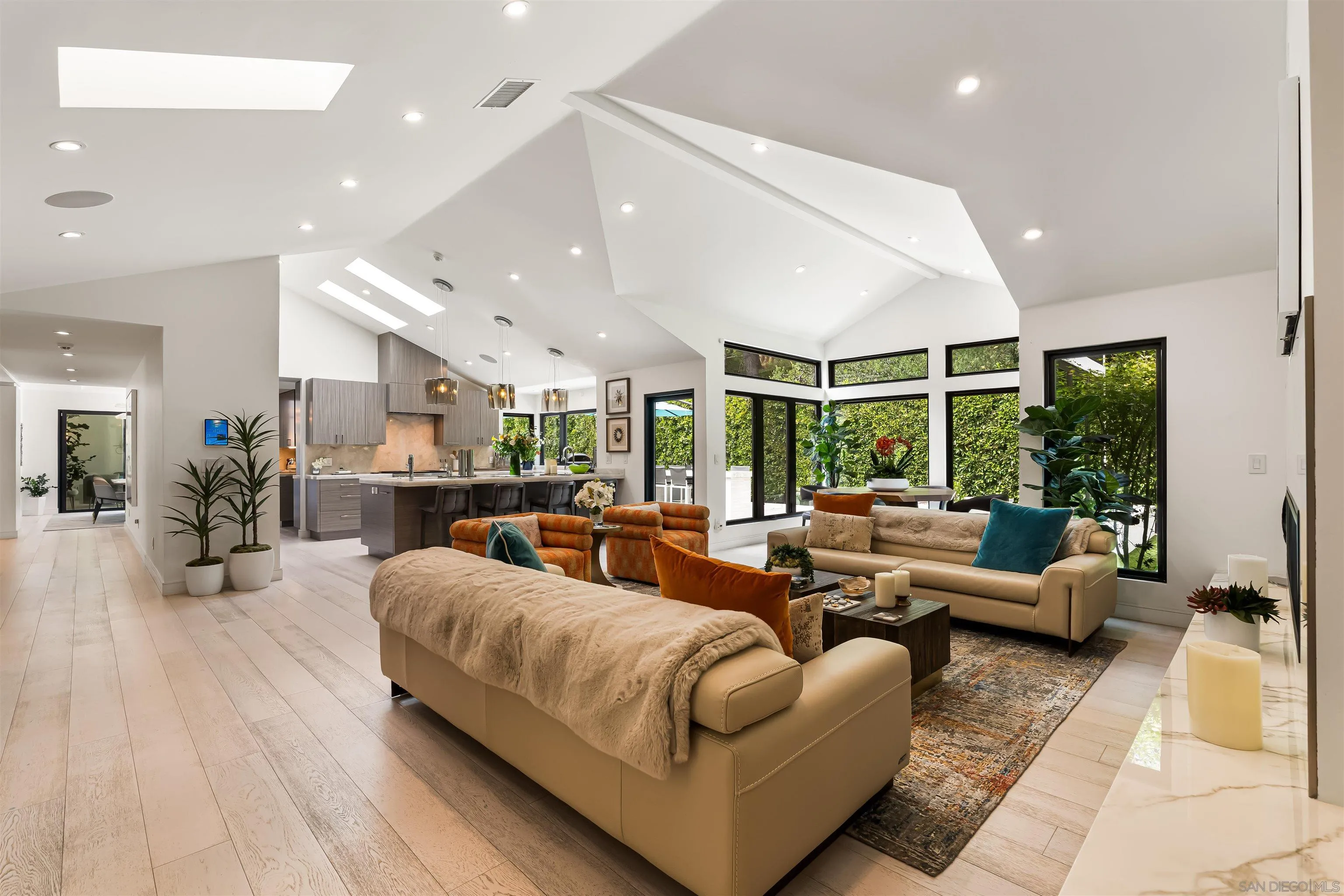 6887 Avenida Andorra La Jolla, CA 92037 - Photo 27 of 75 a living room with furniture and a large window