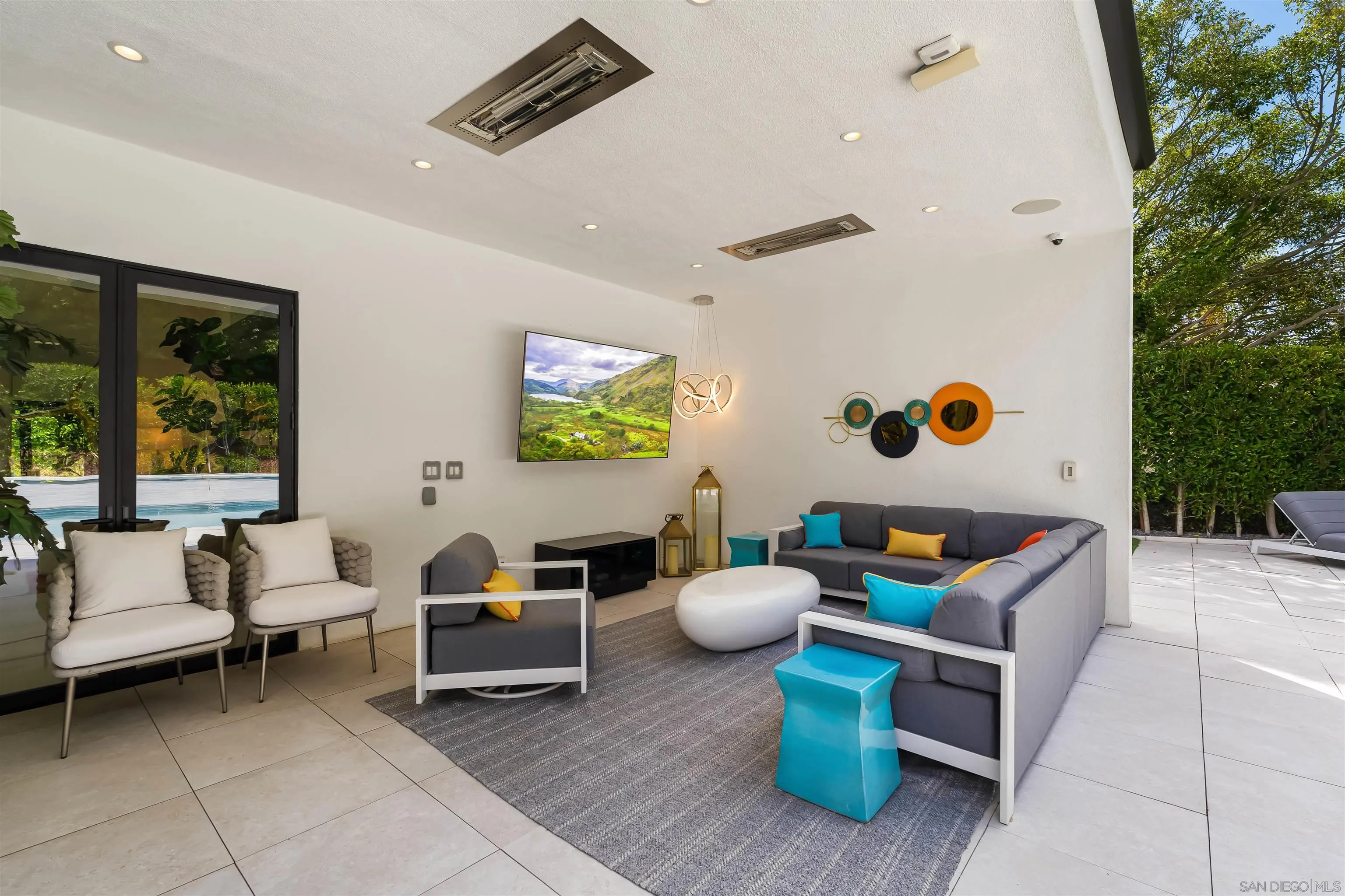 6887 Avenida Andorra La Jolla, CA 92037 - Photo 50 of 75 a living room with furniture and a potted plant