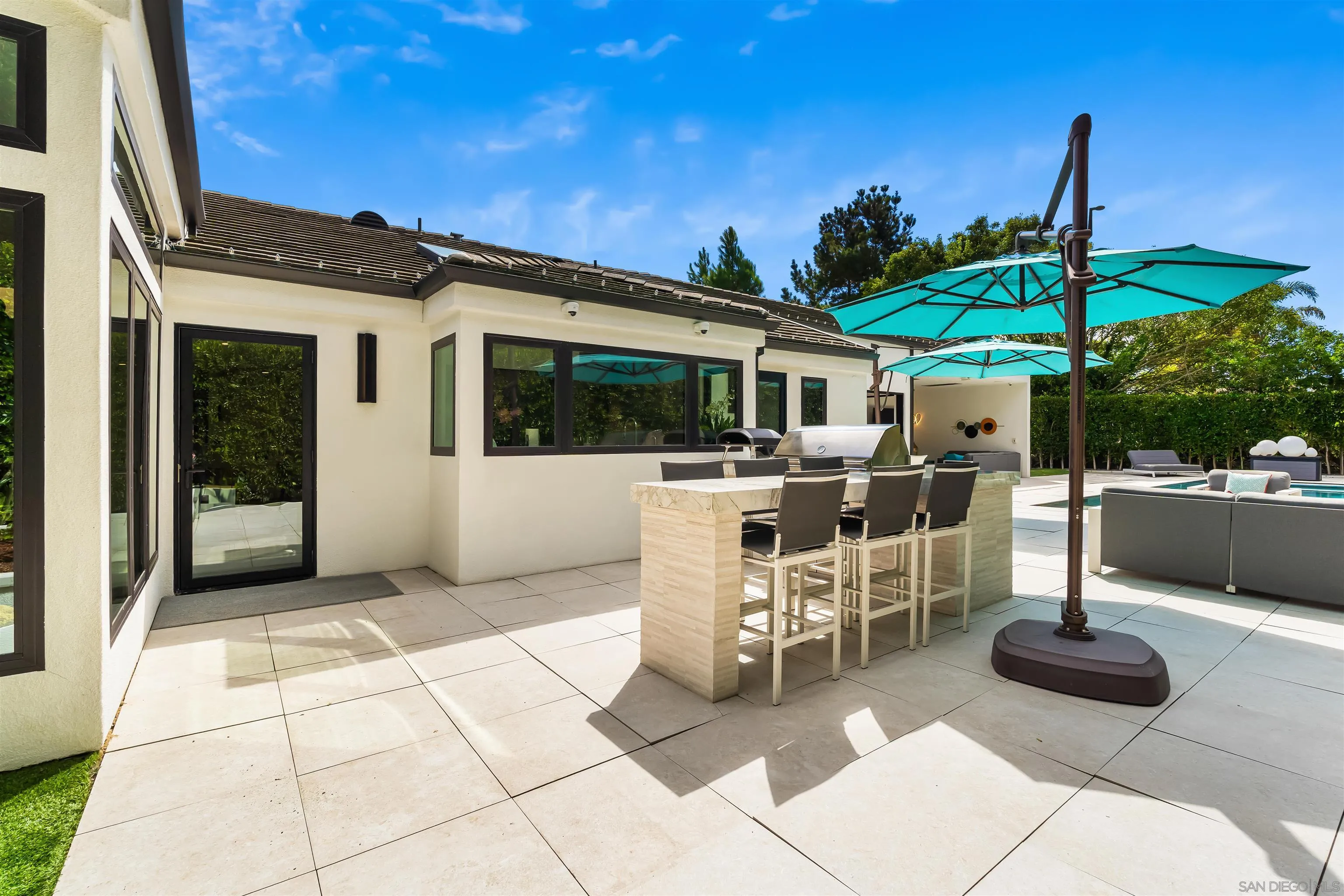 6887 Avenida Andorra La Jolla, CA 92037 - Photo 60 of 75 a patio with a table and chairs