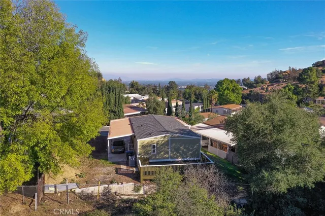 an aerial view of a house with a garden