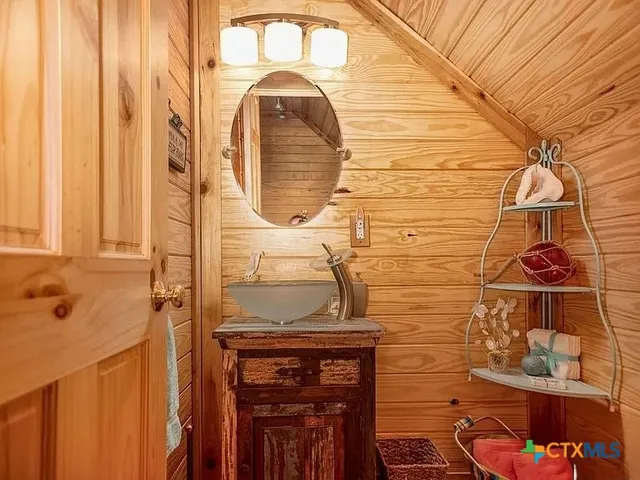 a view of balcony with wooden floor