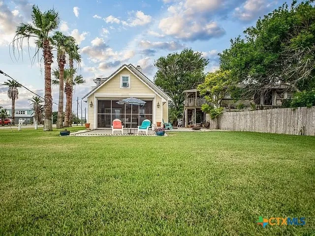 a lawn chairs sitting in the middle of a lake