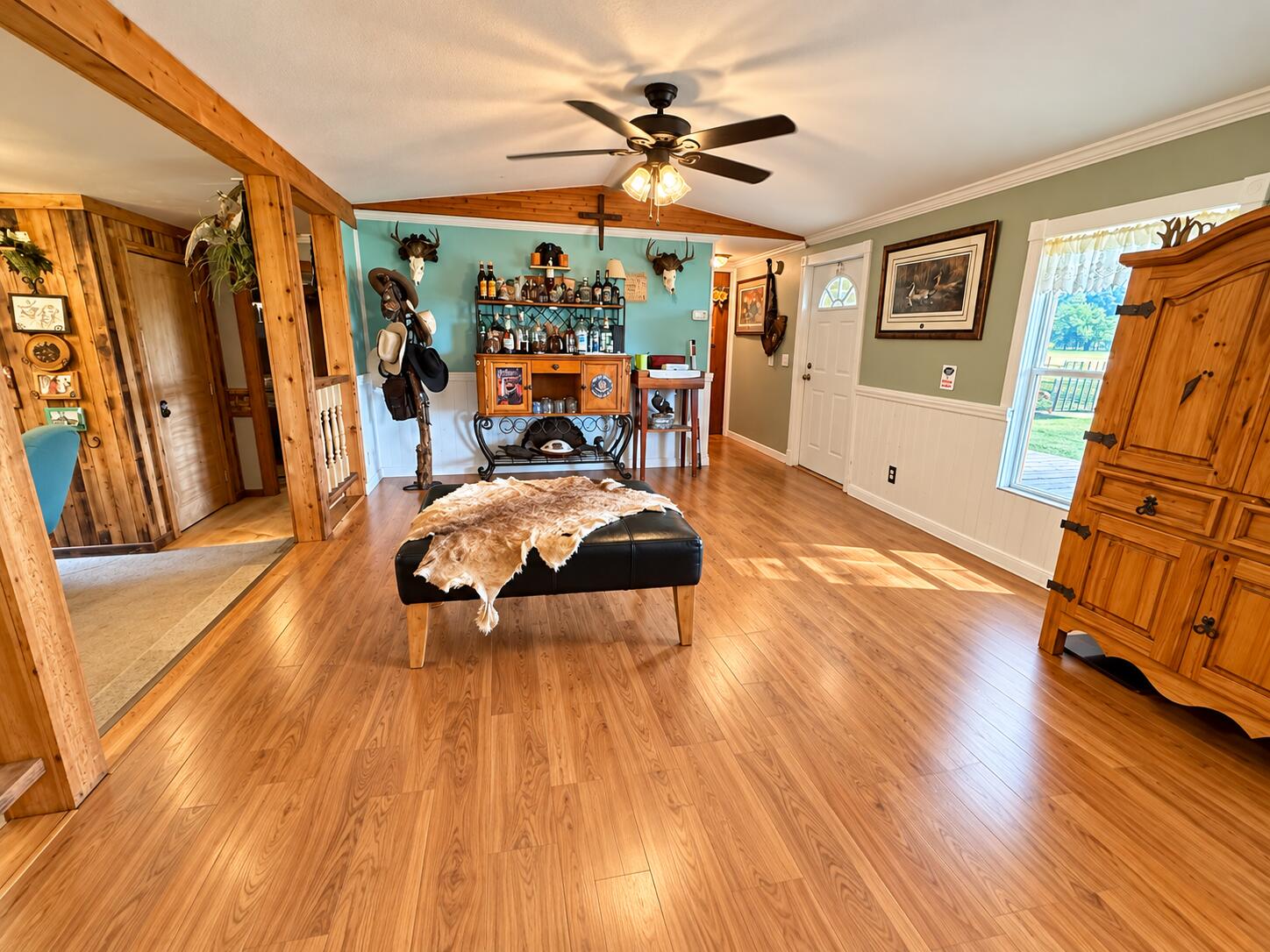 1042 Arbuckle Branch Road Sebring, FL 33870 - Photo 5 of 43 Rustic Teal Cabin Bar Entryway