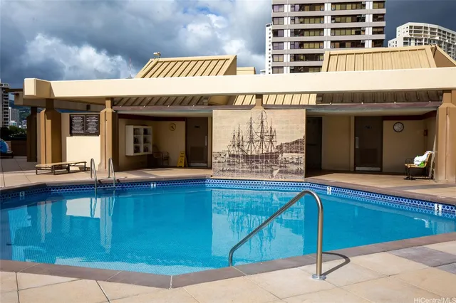 a view of a house with a swimming pool