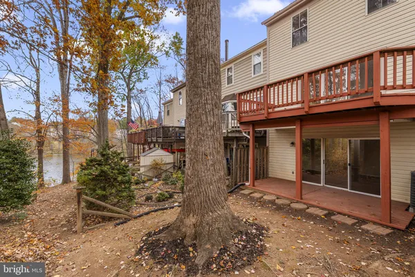 a view of a backyard of the house