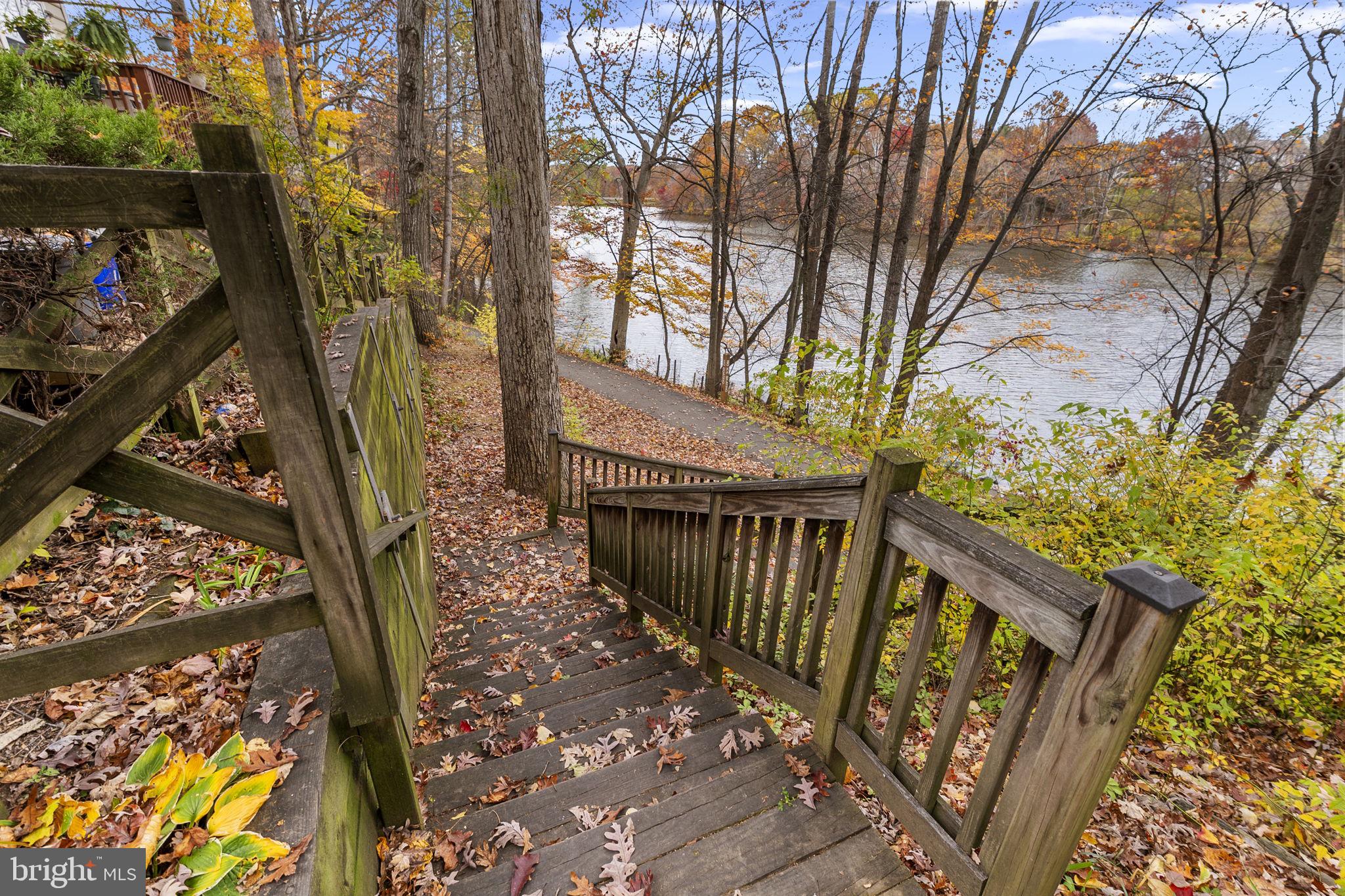 4 Waterside Court Germantown, MD 20874 - Photo 36 of 37 a view of balcony with wooden fence and floor