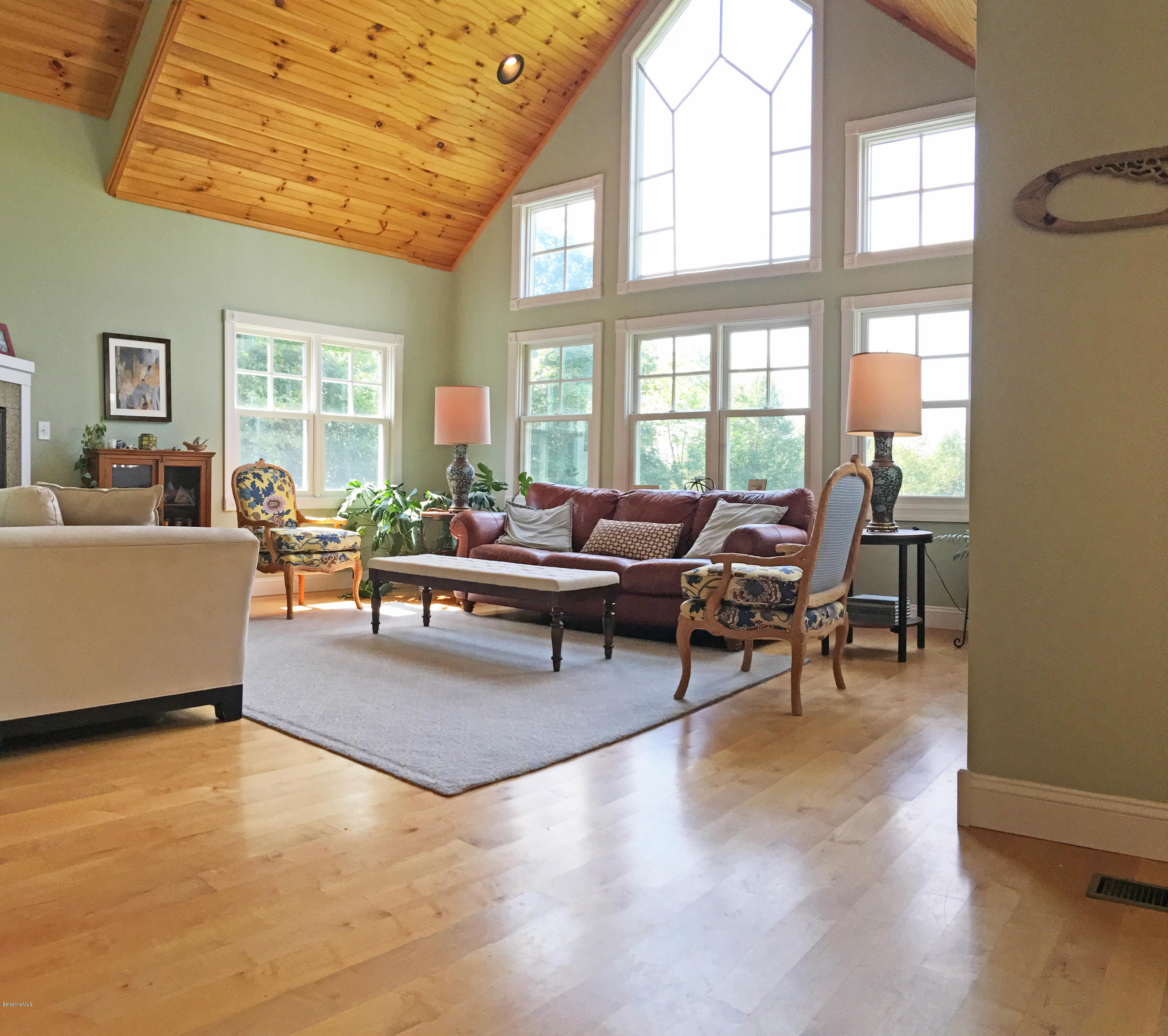 93 Stebbins Road Otis, MA 01253 - Photo 14 of 41 a living room with furniture and large windows