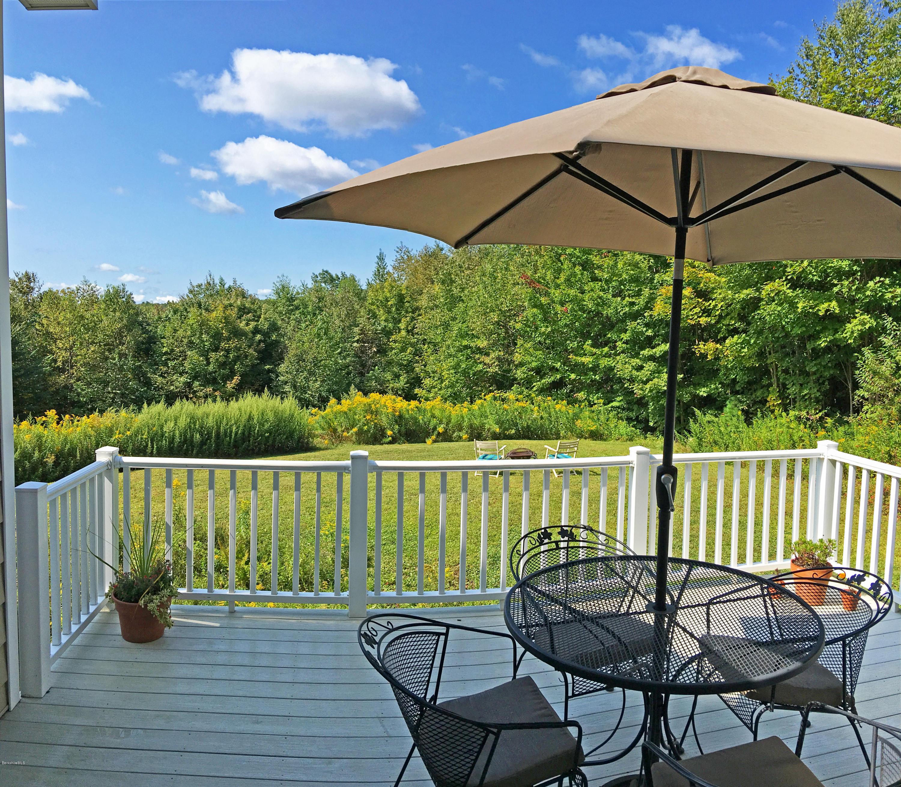 93 Stebbins Road Otis, MA 01253 - Photo 19 of 41 a view of a chairs and table in the balcony