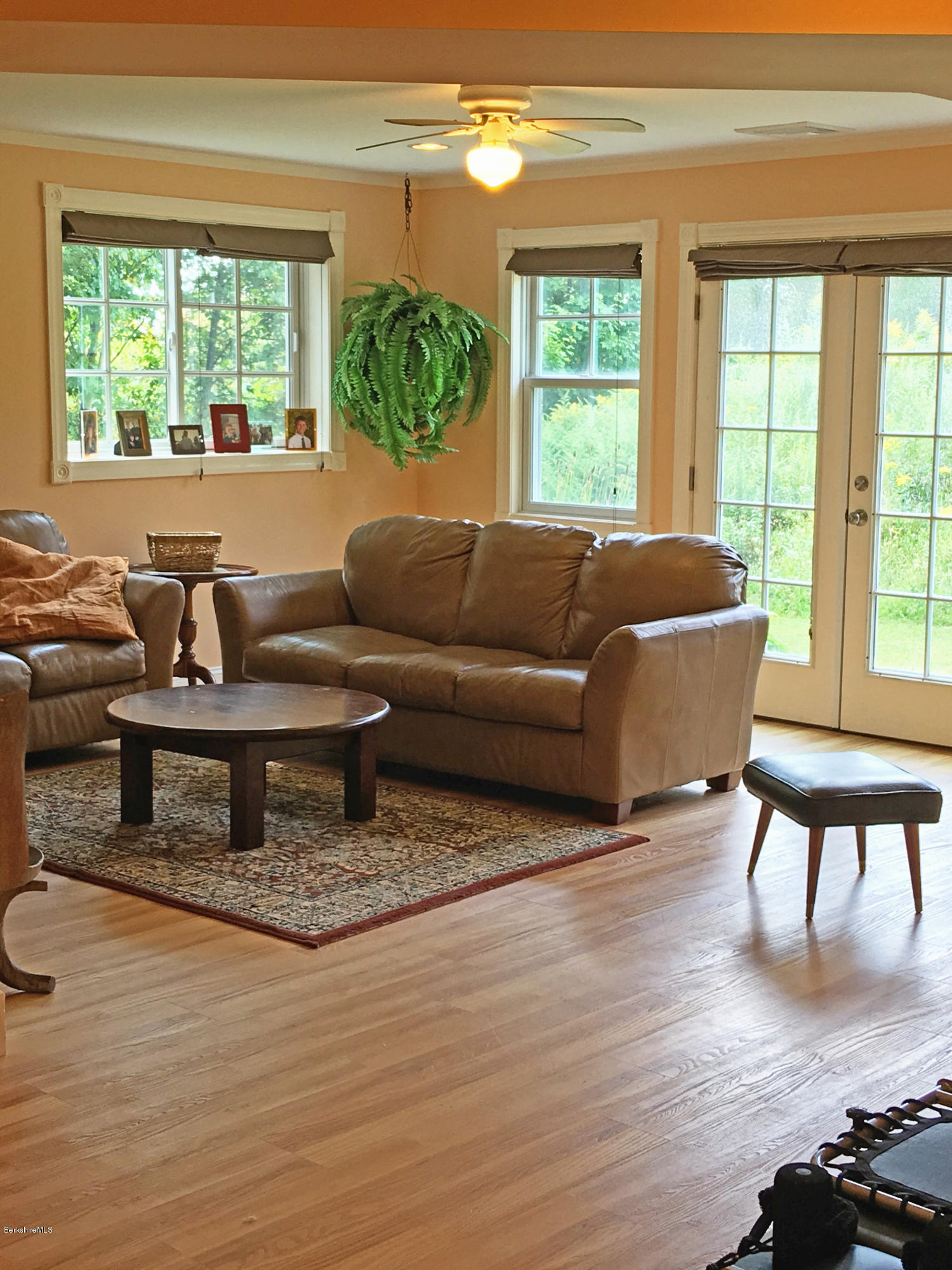 93 Stebbins Road Otis, MA 01253 - Photo 31 of 41 a living room with furniture and a large window