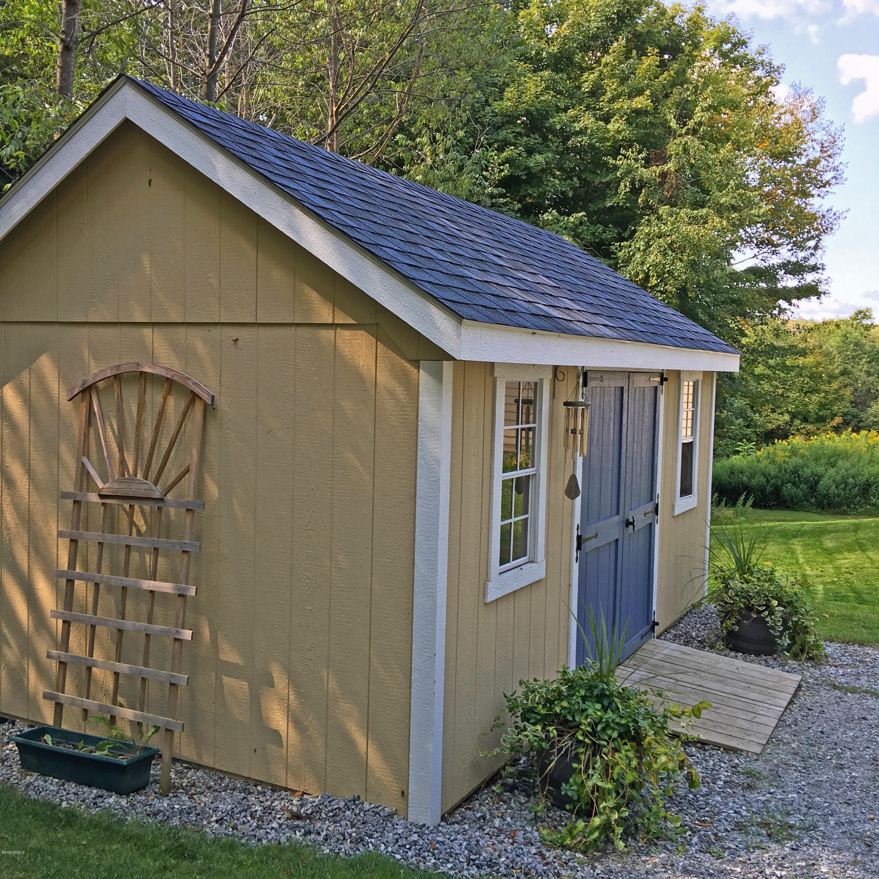 93 Stebbins Road Otis, MA 01253 - Photo 35 of 41 a backyard of a house with lots of green space