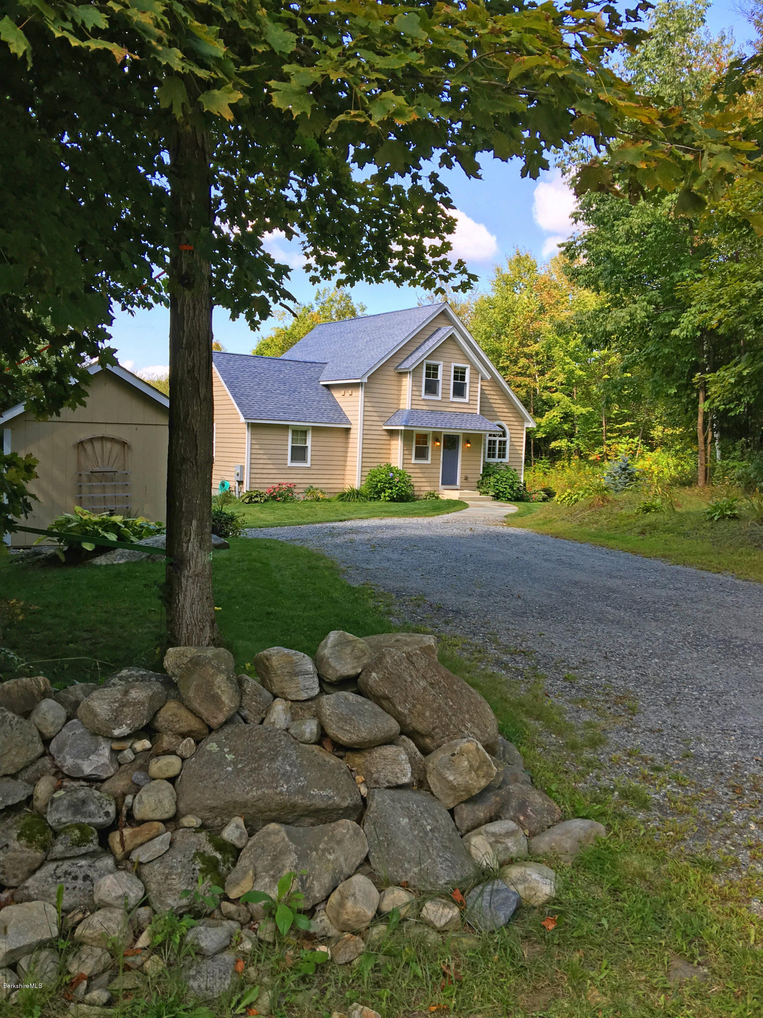 93 Stebbins Road Otis, MA 01253 - Photo 38 of 41 a front view of a house with garden