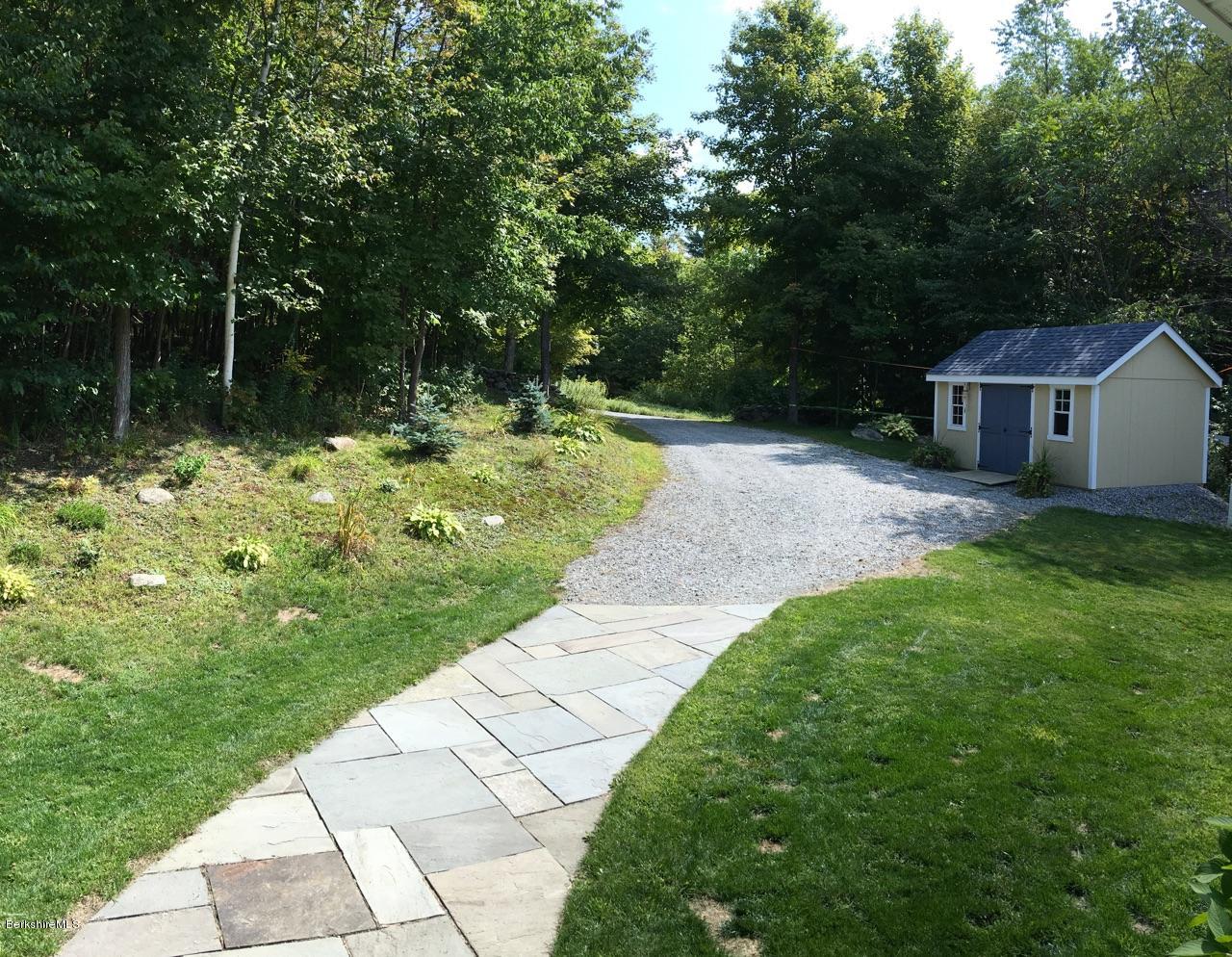 93 Stebbins Road Otis, MA 01253 - Photo 5 of 41 a backyard of a house with lots of green space