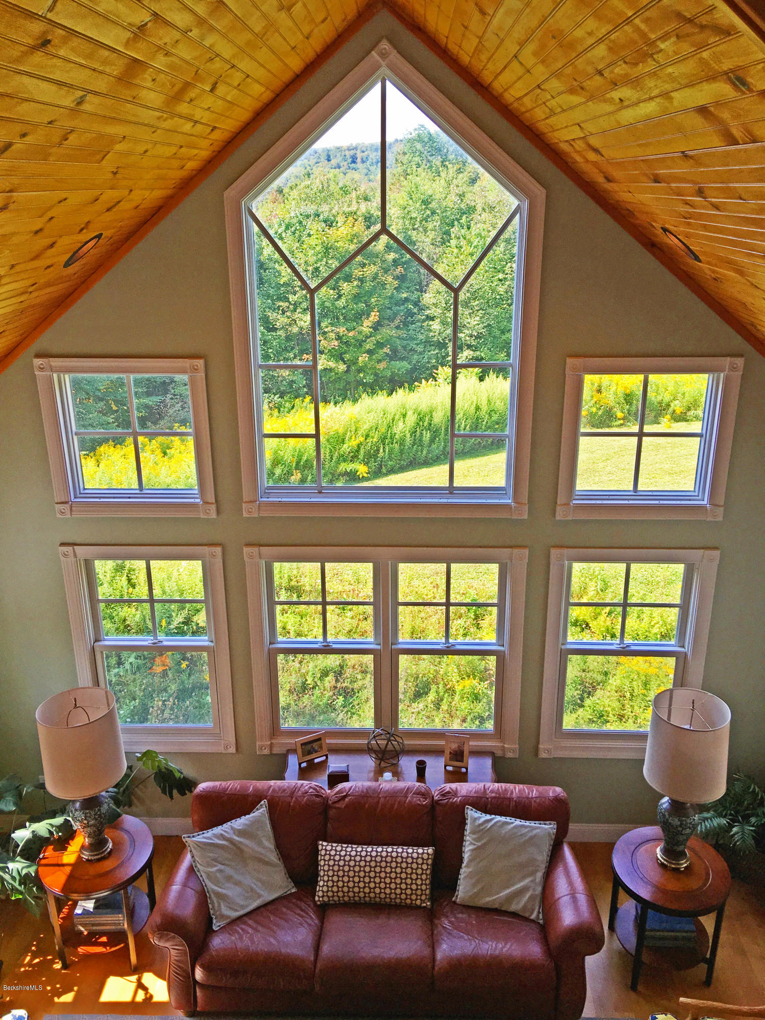 93 Stebbins Road Otis, MA 01253 - Photo 6 of 41 a living room with furniture and windows