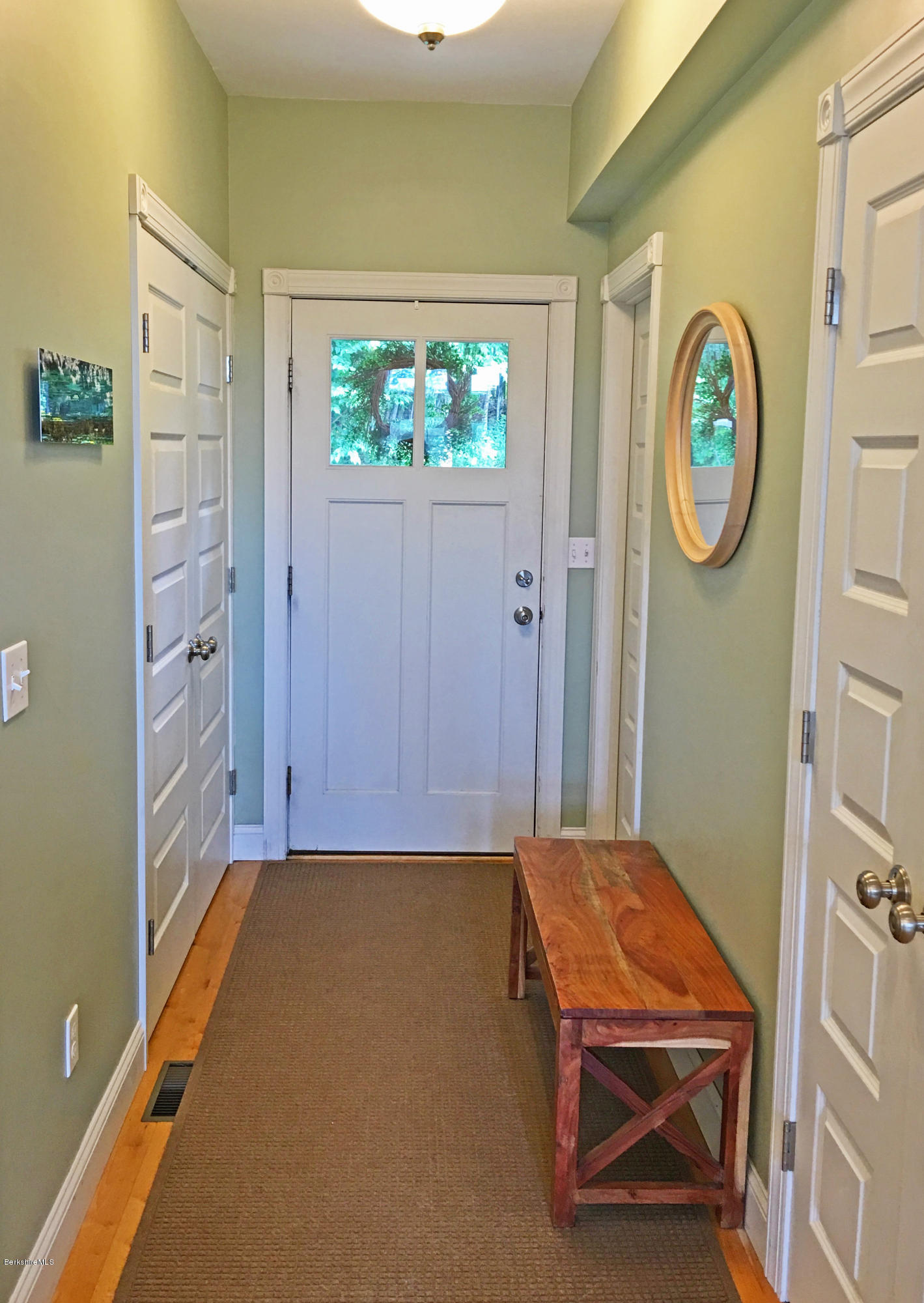93 Stebbins Road Otis, MA 01253 - Photo 7 of 41 a room with a bed and a bookshelf