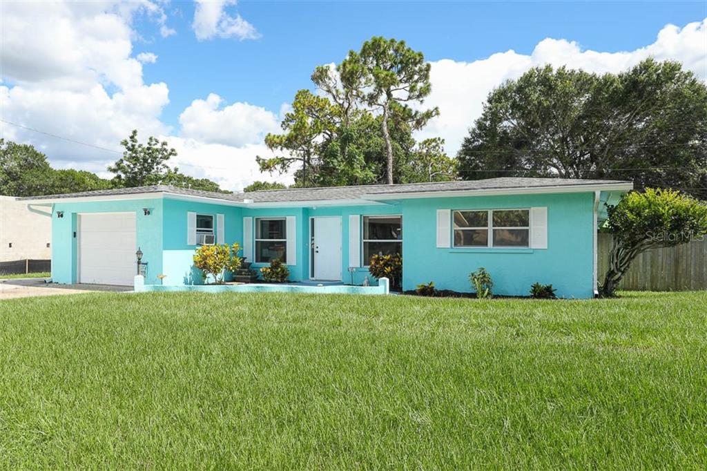 630 Darwin Road Venice, FL 34293 - Photo 1 of 1 front view of a house with a yard