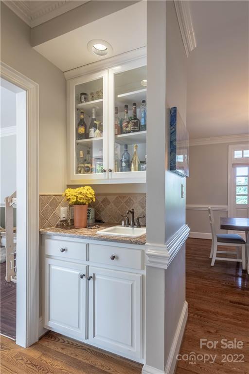 3674 River Road Hickory, NC 28602 - Photo 11 of 48 a room with cabinets and wooden floor