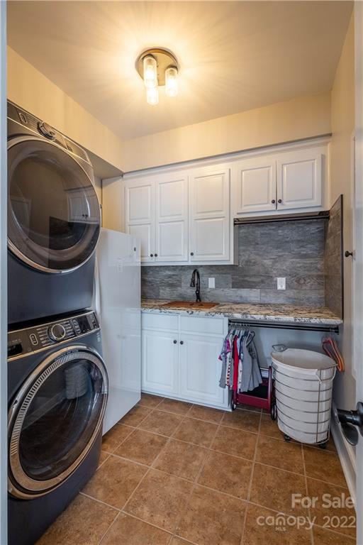 3674 River Road Hickory, NC 28602 - Photo 27 of 48 a kitchen with a sink and a stove top oven