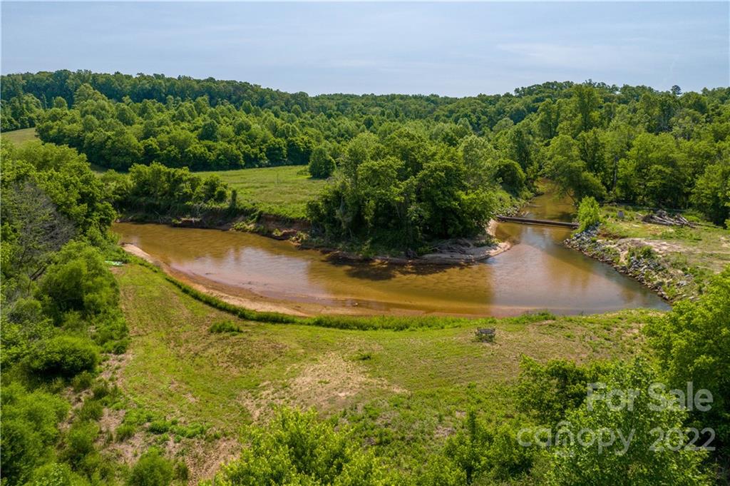 3674 River Road Hickory, NC 28602 - Photo 37 of 48 a view of a swimming pool with a yard