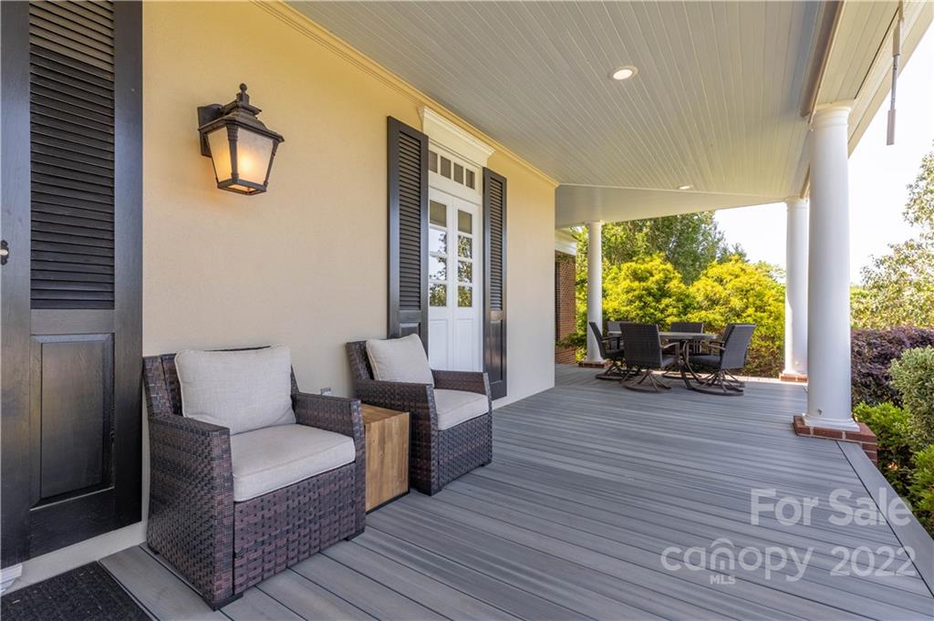 3674 River Road Hickory, NC 28602 - Photo 4 of 48 a living room with furniture and large windows