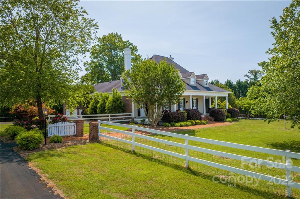 3674 River Road Hickory, NC 28602 - Photo 41 of 48 a view of a house with swimming pool and sitting area