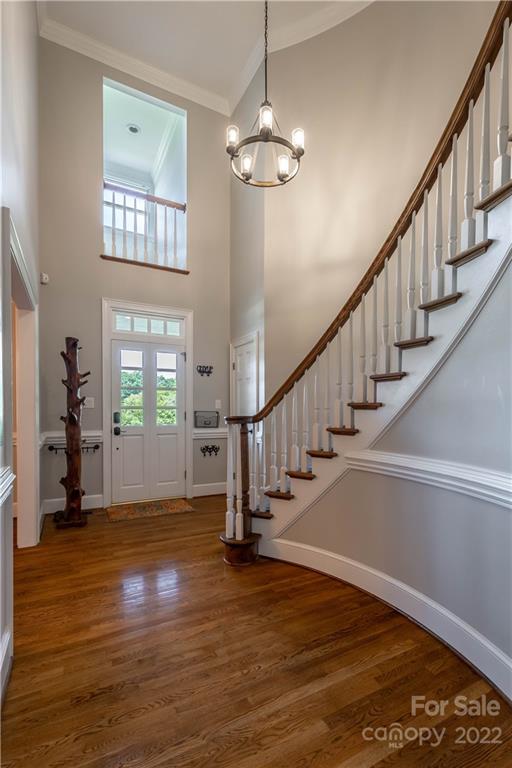 3674 River Road Hickory, NC 28602 - Photo 5 of 48 a view of an entryway with wooden floor and a front door