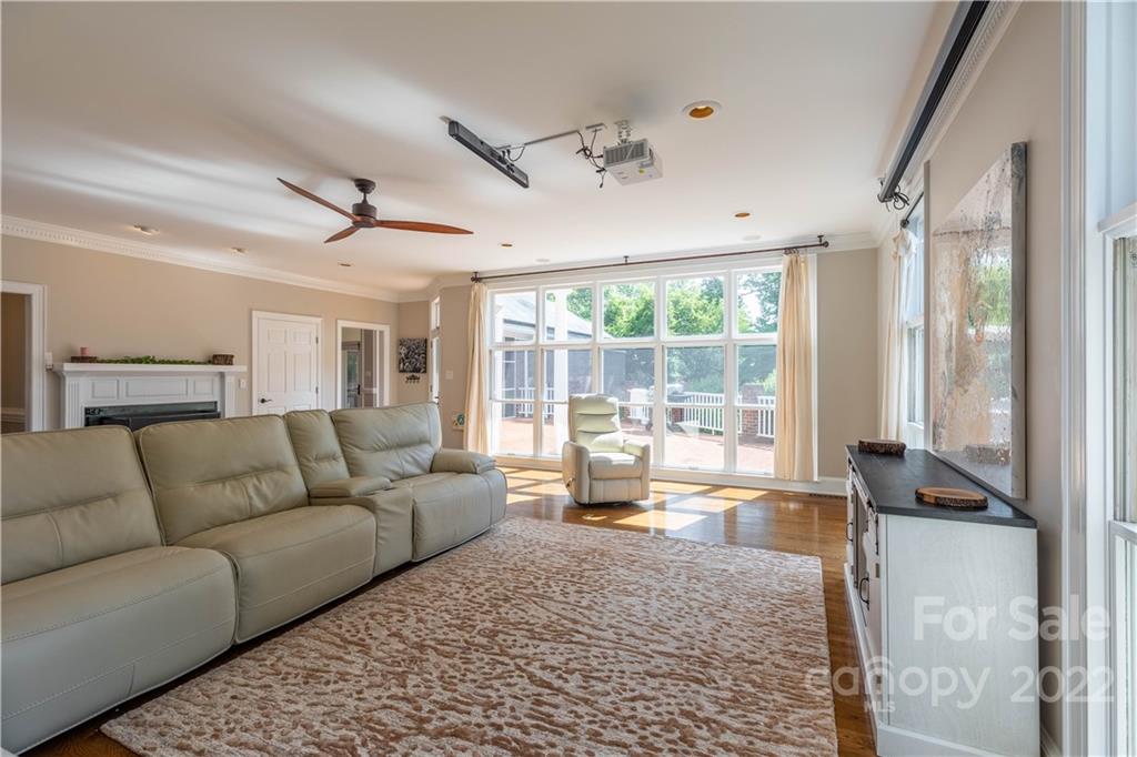 3674 River Road Hickory, NC 28602 - Photo 7 of 48 a living room with furniture and a large window