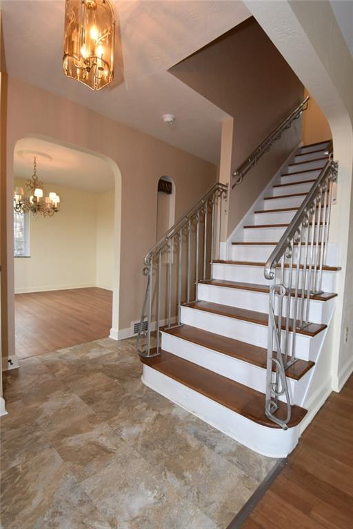 23 Swallow Hill Road Carnegie, PA 15106 - Photo 2 of 24 Enter the home. To the left is the dining room and to the right is the living room. The staircase is wide enough to move large furniture to the second floor.