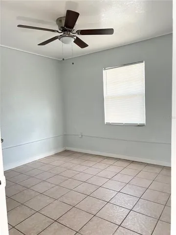 a view of a room that has a window in it